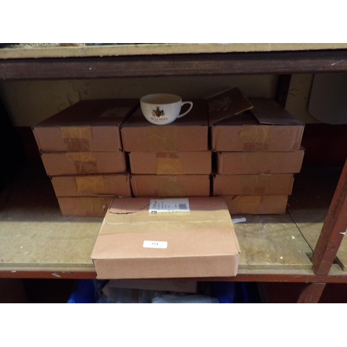 524 - Thirteen boxes of Cappuccino cups bearing the De La Haye coat of arms