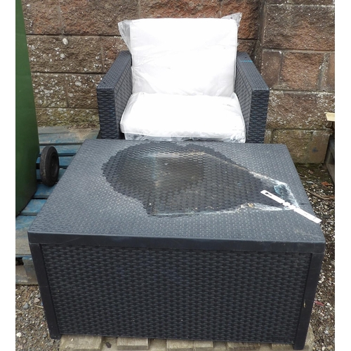 64 - An all weather rattan armchair together with a matching storage box/table