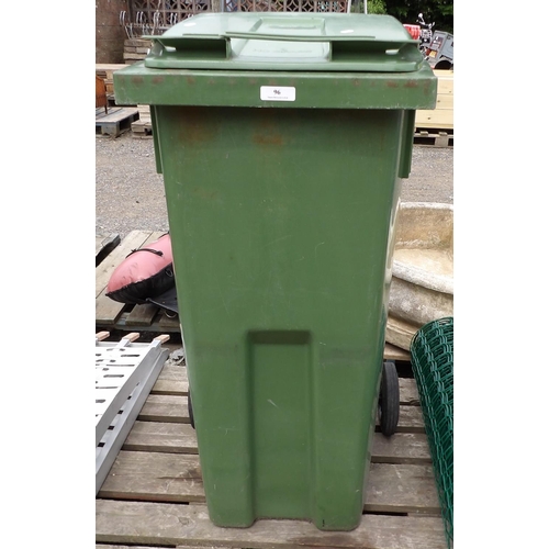 96 - A green PVC wheelie bin