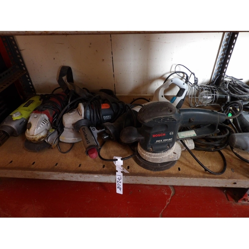 141 - A varied assortment of power tools, battery chargers etc.