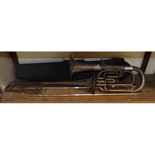 172 - A vintage trombone together with a vintage tenor horn