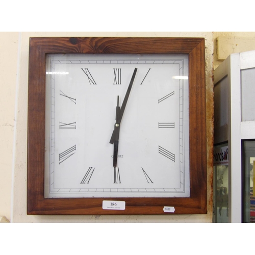 186 - A quartz wall clock of square form