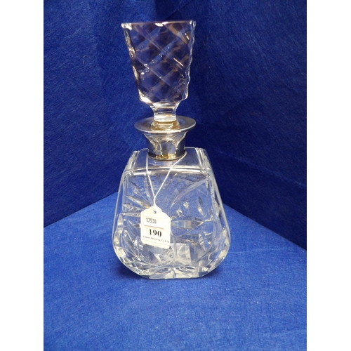 190 - A crystal decanter with solid silver mount