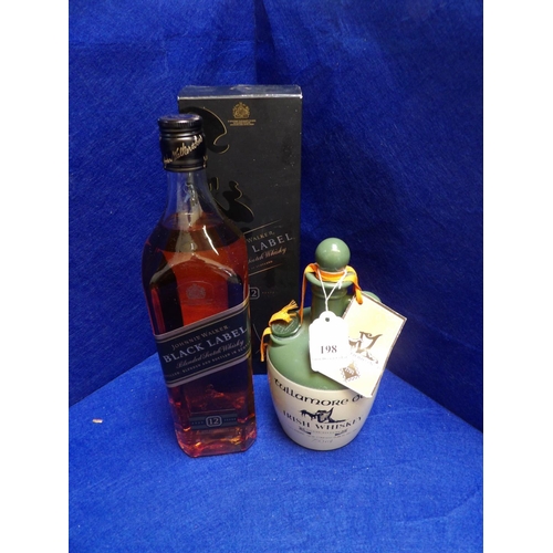 198 - A 1L presentation bottle of Johnnie Walker Black Label blended Scotch Whisky together with a flagon ... 