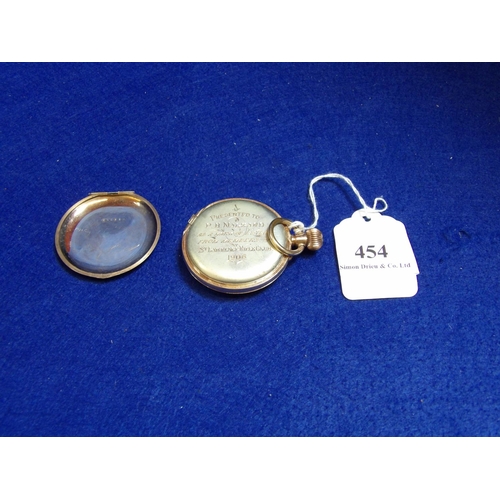 454 - A presentation pocket watch the internal verso inscribed 