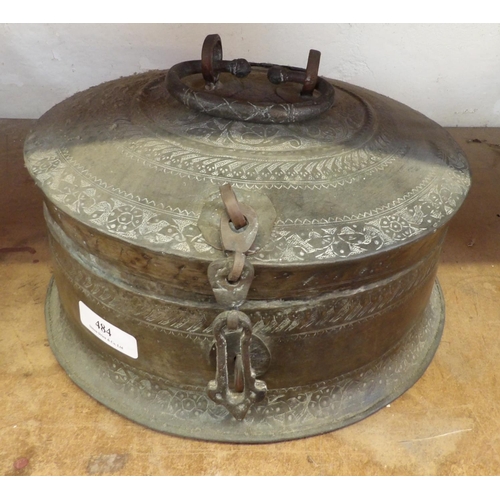 484 - A vintage oriental brass circular lidded chest with profuse engraved decoration