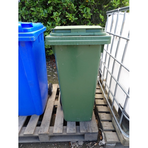 73 - A green PVC wheelie bin