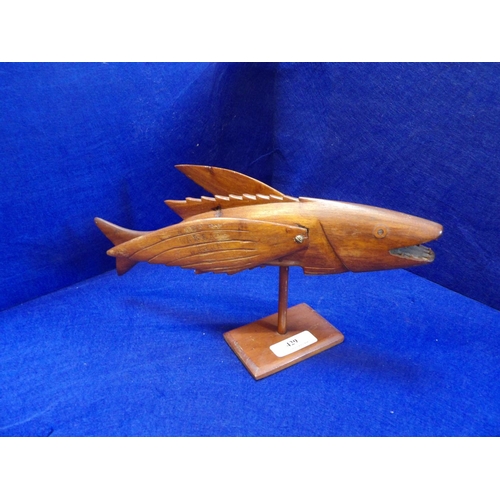 429 - A Pitcairns Island wooden flying fish, signed