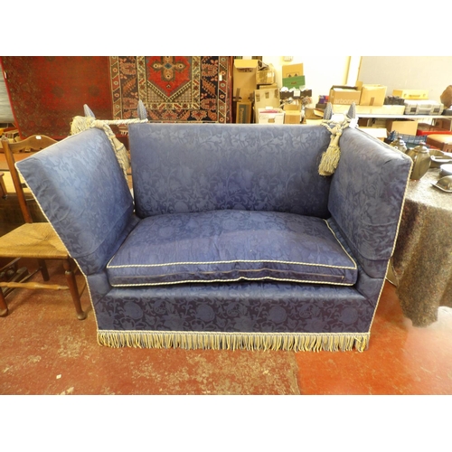 275 - A drop arm sofa upholstered in blue foliate design fabric