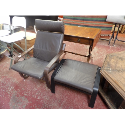 278 - An open armchair and foot stool upholstered in brown coloured leather in the modernist style