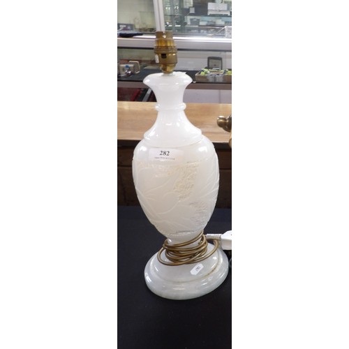 282 - An alabaster table lamp modelled in the form of a vase