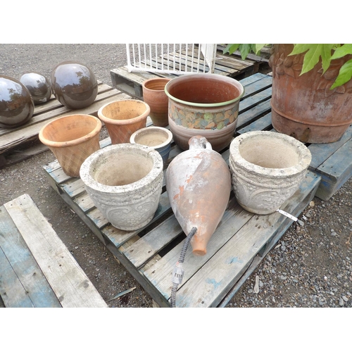 130 - Assorted salt glazed stoneware and terracotta planters together with a water feature modelled from a... 