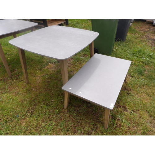 18 - A limed effect and grey finished patio table together with a matching coffee