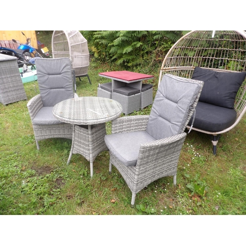 24 - A Blue Diamond all weather rattan bistro set comprising of a circular table and two matching chairs