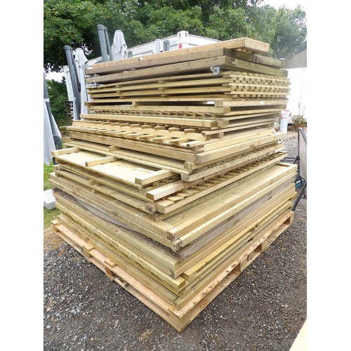 38 - A large assortment of various fencing panels, picket fencing and gates