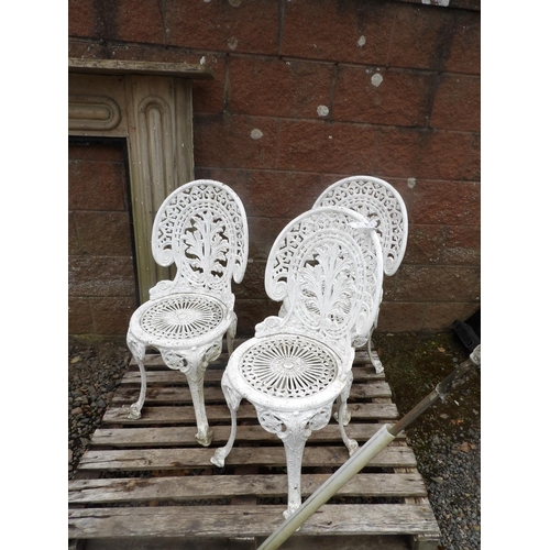 47 - Three pierced aluminium garden chairs