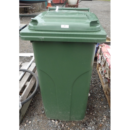 57 - A green PVC wheelie bin