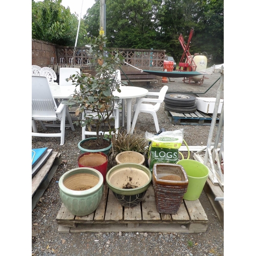 61 - Various salt glazed stone ware planters, a bag of Superdry logs and a hose and reel