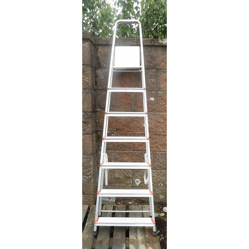 64 - A Titan seven tread aluminium step ladder