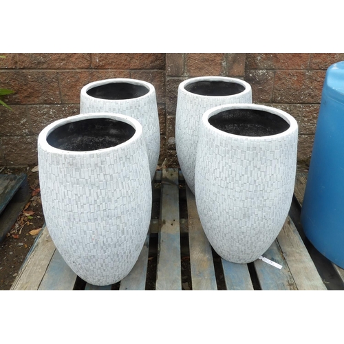 71 - A set of four circular tapered planters