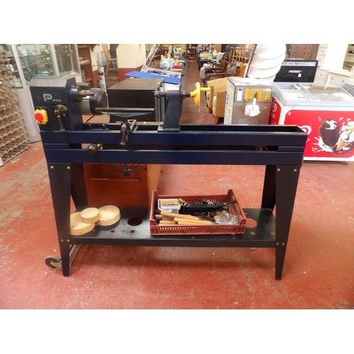 168 - A Performance Power copy lathe together with a range of chisels and other accessories