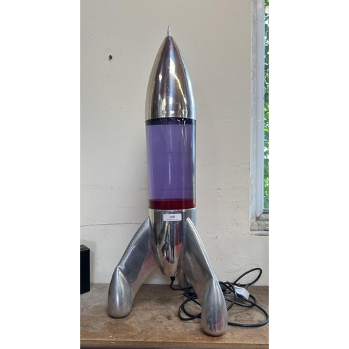 160 - A retro lava lamp modelled in the form of a space rocket of large proportion 84cm high