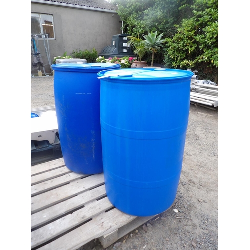 102 - Two blue PVC barrels