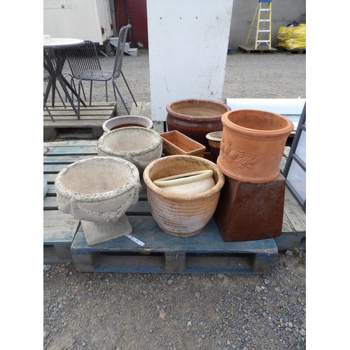 107 - Assorted terracotta and stone ware pots and planters