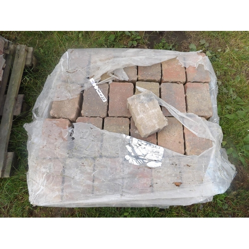 27 - Four and a quarter pallets of rectangular shaped brick pavers