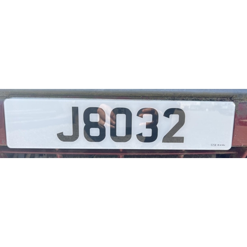 1 - J8032 - A four digit registration mark assigned to a non-running vehicle of insignificant value