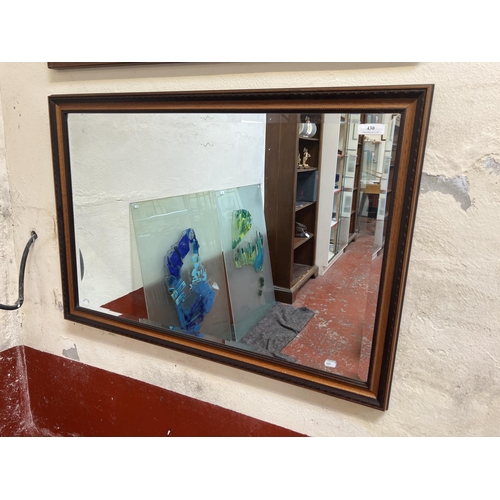 430 - A rectangular bevelled wall mirror