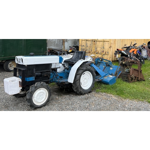 13 - A Mitsubishi four wheel drive compact tractor complete with power harrow, packer roller, flail mower... 