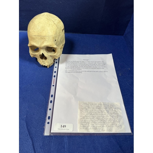 149 - A vintage human skull discovered from the under the stage of St. Peter's Parish Hall and purportedly... 