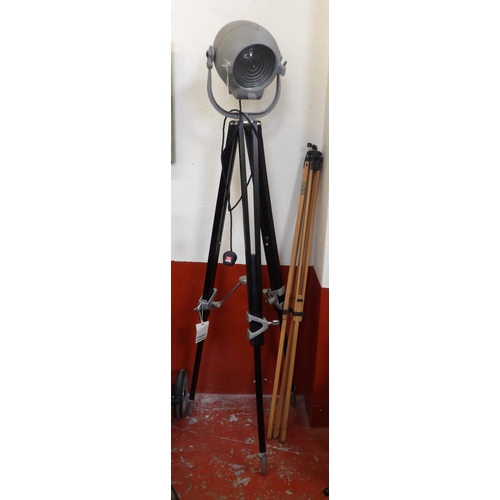 227 - A floor standing lamp manufactured from a vintage opera house spot light together with a vintage 