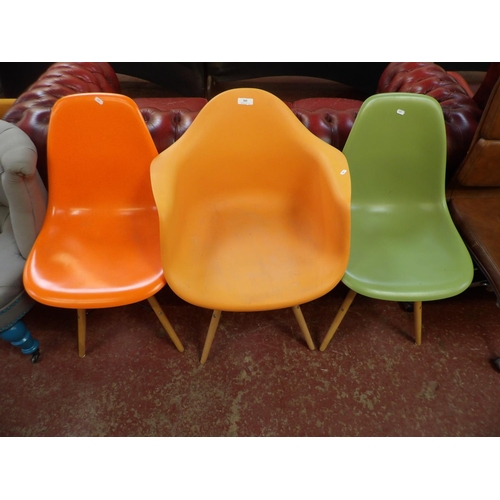 305 - Three plastic chairs in the Modernist style