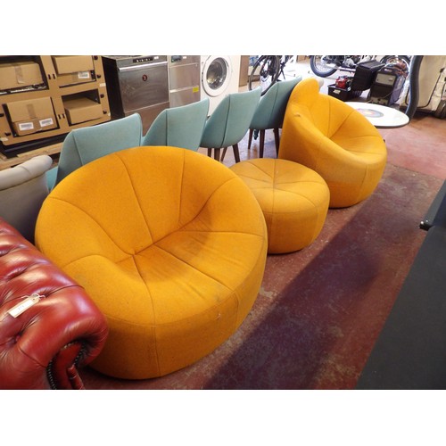 270 - A pair of retro tub chairs and matching stool upholstered in orange coloured fabric