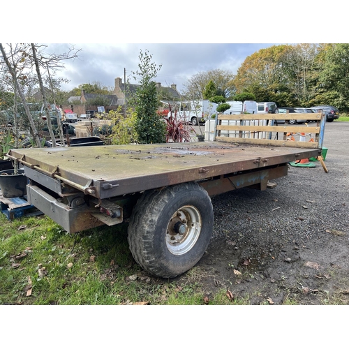 37 - An agricultural tractor trailer with hydraulic tipping and hydraulic braked axle