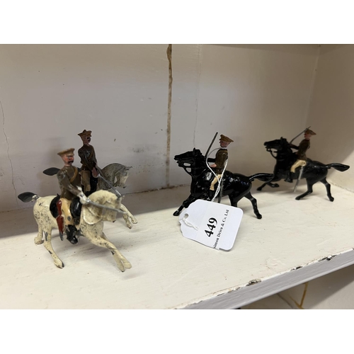 449 - Four vintage lead cavalrymen figures