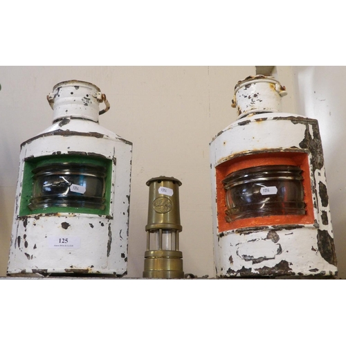 125 - A pair of vintage ships navigational lanterns together with an ornamental miner's safety lantern