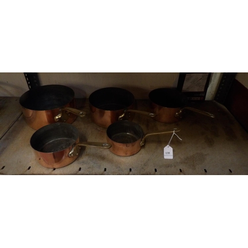 135 - A set of five good quality copper saucepans