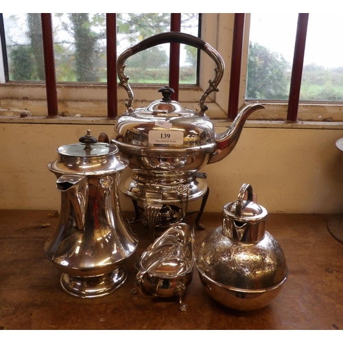 139 - A silver plated spirit kettle and stand together with three other pieces of silver plated ware