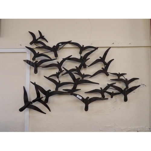 203 - A piece of metallic wall art depicting a flock of birds