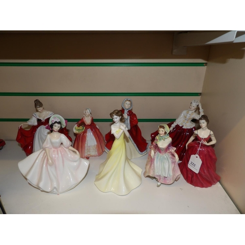 222 - Eight Royal Doulton figures of women