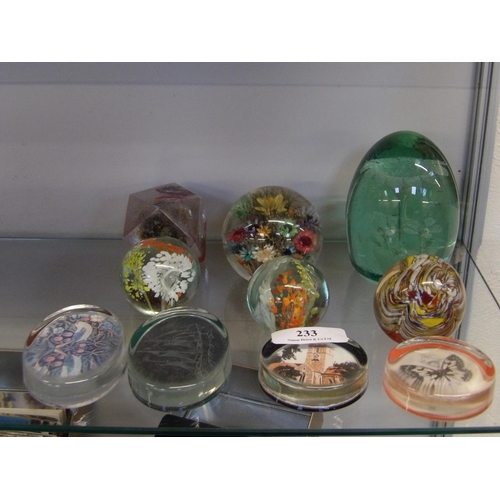 233 - A selection of glass paper weights