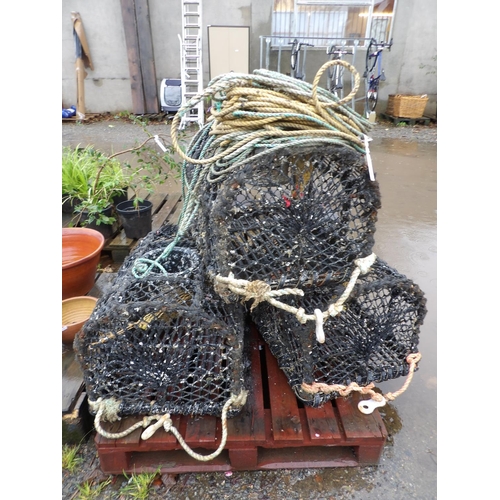 88 - Three lobster pots complete with backline