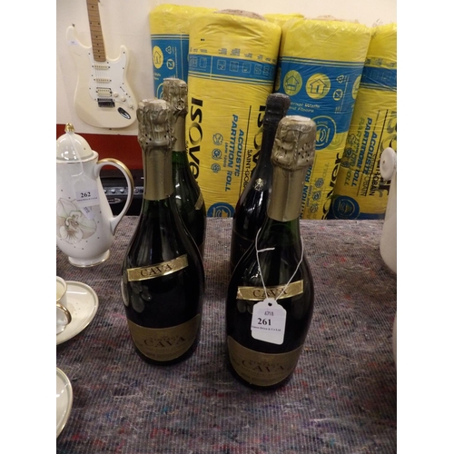 261 - Three bottles of vintage Cava together with a bottle of sparkling Merlot