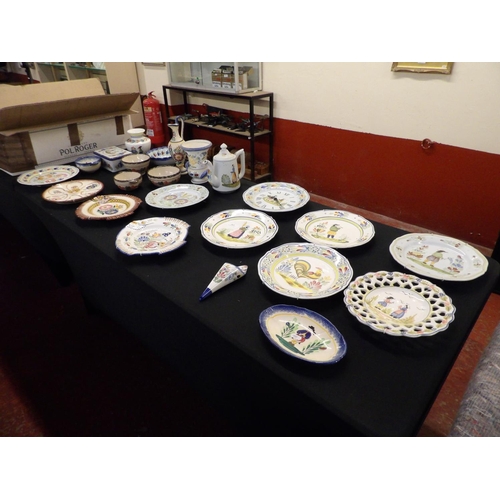 263 - A varied assortment of Quimper and other Faience ware