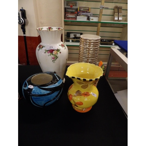 274 - Three ceramic vases together with a jug