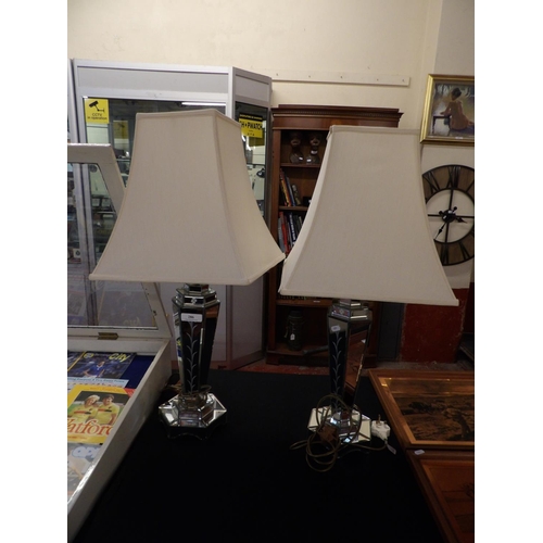 286 - A pair of mirrored and bevelled glass table lamps