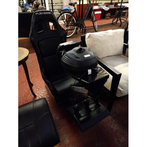 300 - A Playseat together with a thrust master console